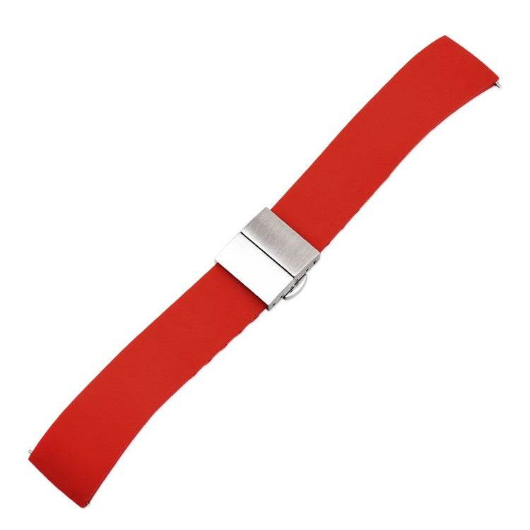 Red silicone watch strap with brushed stainless-steel center clasp, quick release feature.