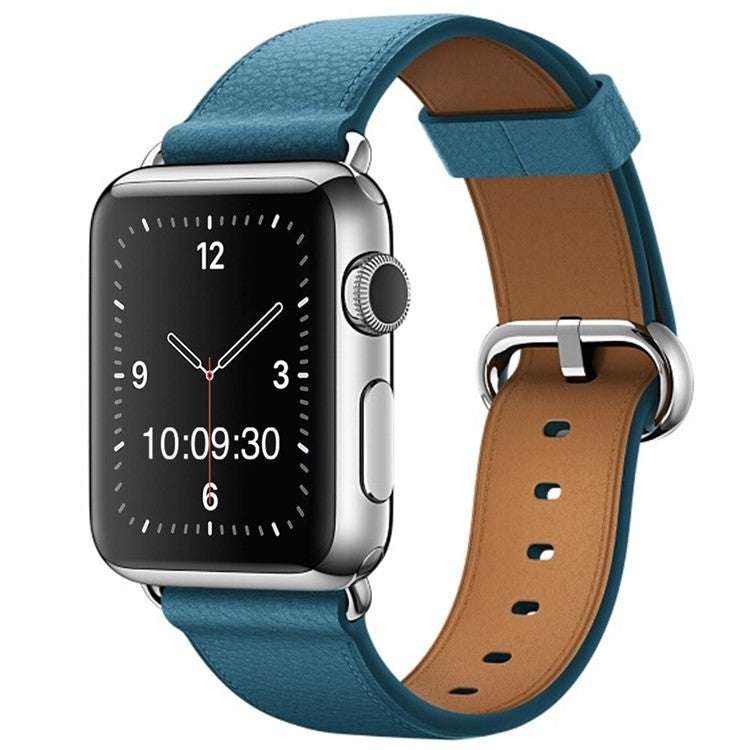 Classic leather watch strap with silver buckle attached to Apple Watch.