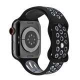 Silicone sport Apple Watch strap in Black/White, compatible with 38-40mm and 42-44mm sizes, featuring a breathable design for active lifestyles.
