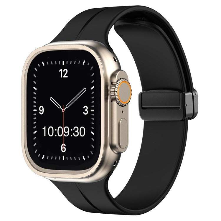 Magnetic silicone sport Apple Watch strap in black, compatible with all sizes and generations.