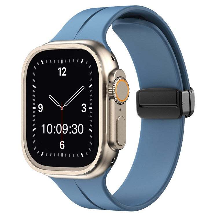 Magnetic silicone sport Apple Watch strap in blue, compatible with all sizes and generations.