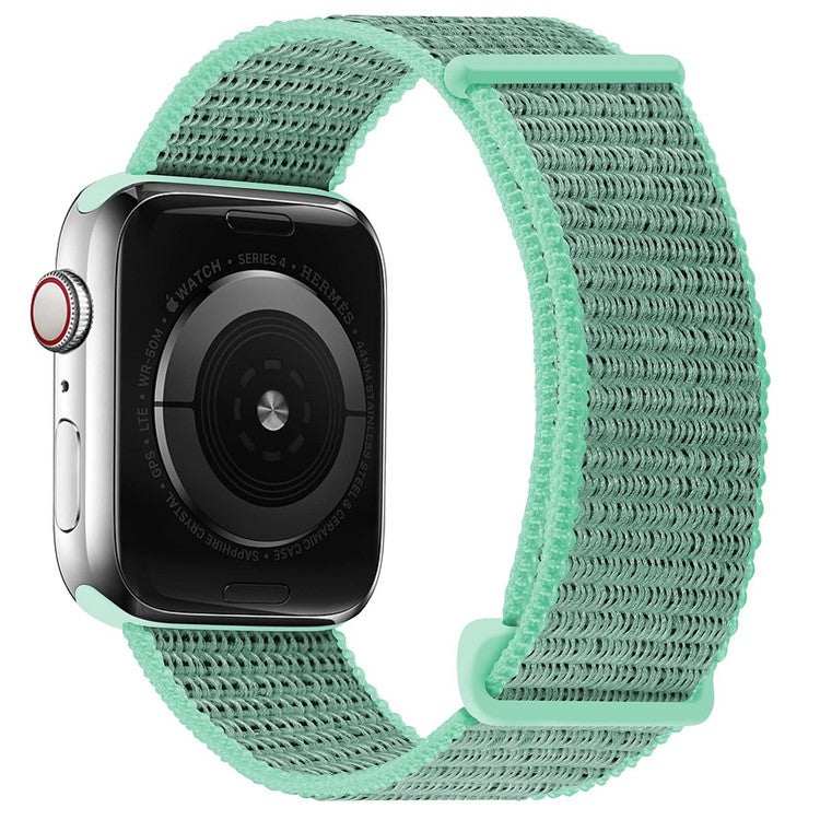 Woven nylon sport loop watch strap for Apple Watches in mint green color.
