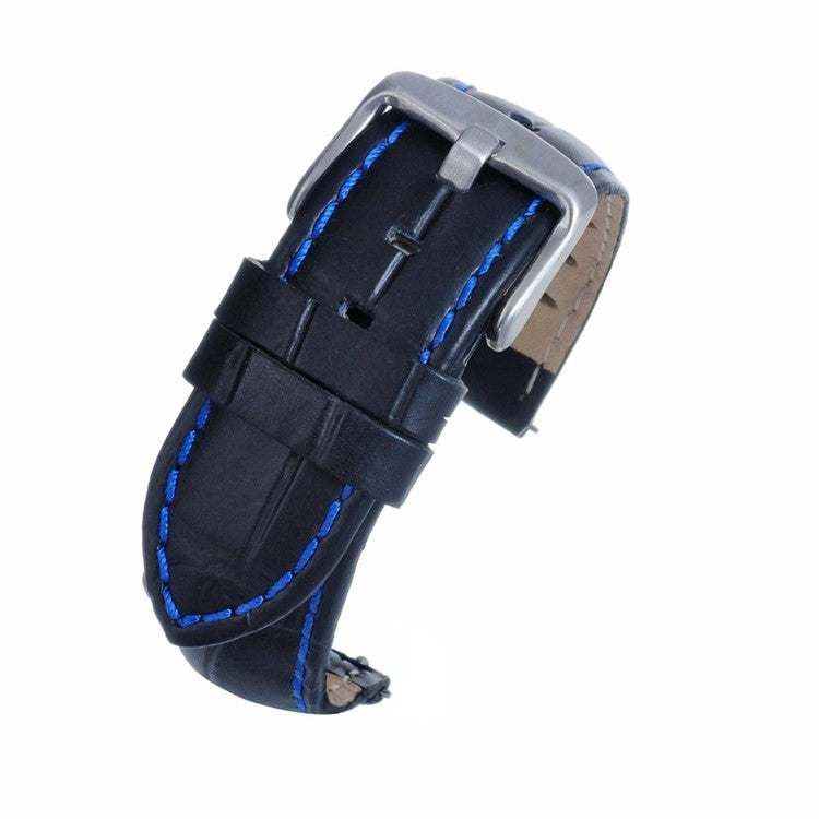 Black alligator grain watch strap with bold blue stitching and quick release feature.