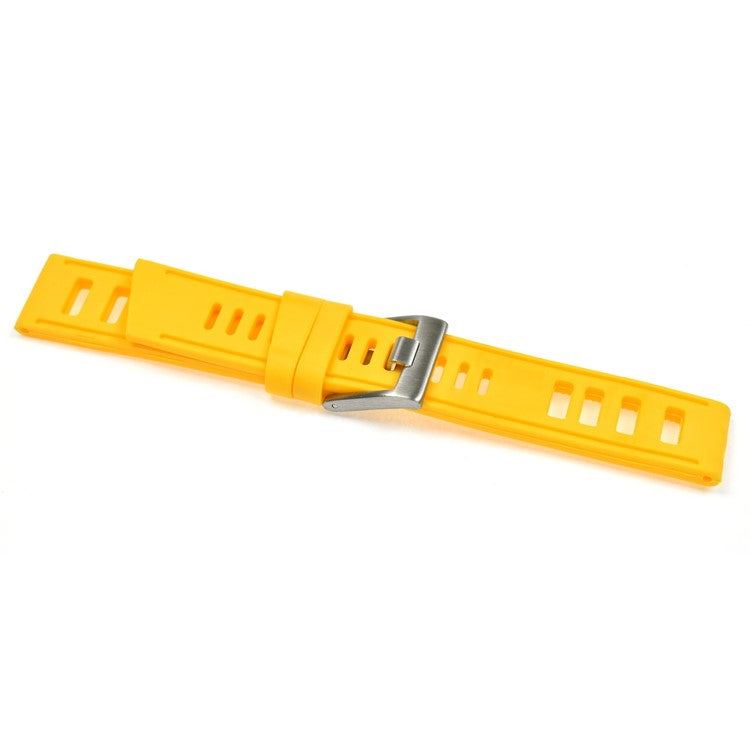 Yellow silicone watch strap with cut-out design and brushed stainless steel buckle.