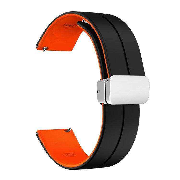 Quick release silicone watch strap with two-color design and folding clasp.