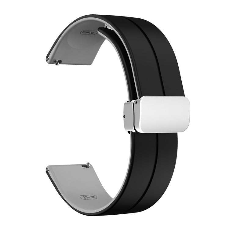Two-color silicone watch strap with folding clasp and quick-release feature.