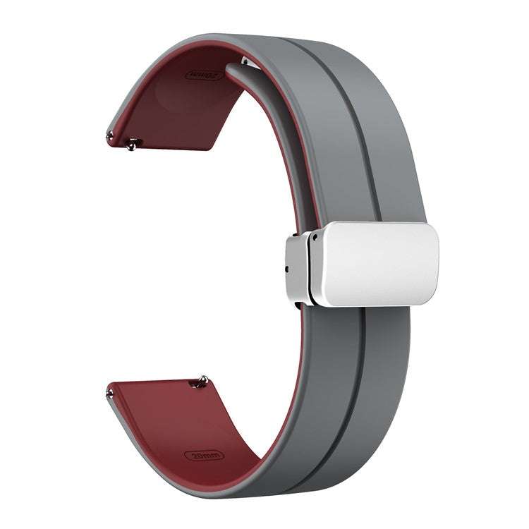 Two-color silicone watch strap with folding clasp, quick-release design, and contrasting underside.