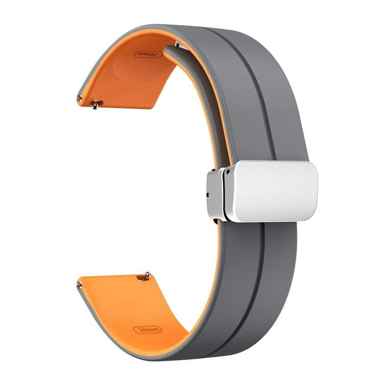Two-tone silicone watch strap with quick-release and folding clasp.