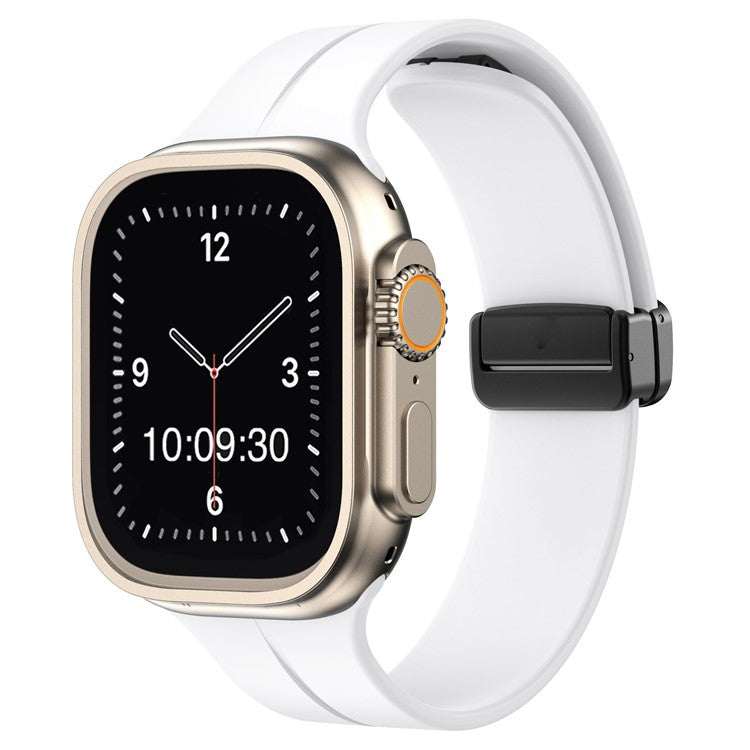 Plain magnetic silicone sport Apple Watch strap in white, compatible with all sizes and generations, featuring secure pin and tuck closure.