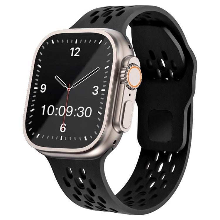 A black silicone mesh Apple Watch strap on a watch, with the watch displayed on a white background.