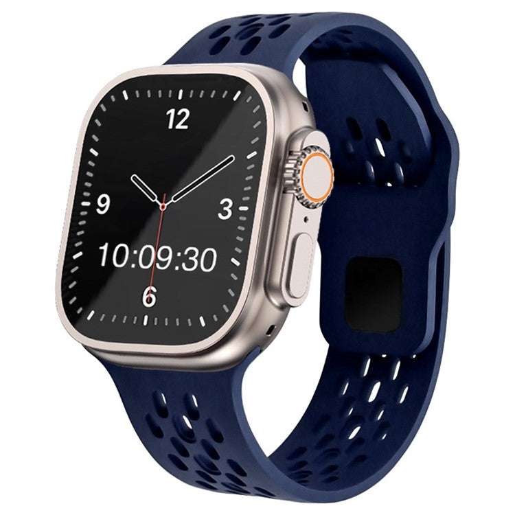 A black silicone mesh Apple Watch strap on a watch, with the watch displayed on a white background.